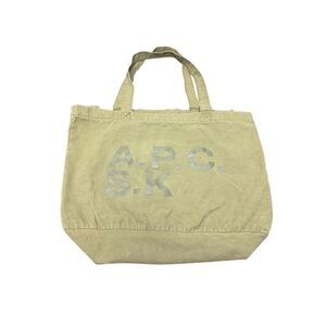 A.P.C. logo-print cotton-canvas tote bag in a khaki or olive color.